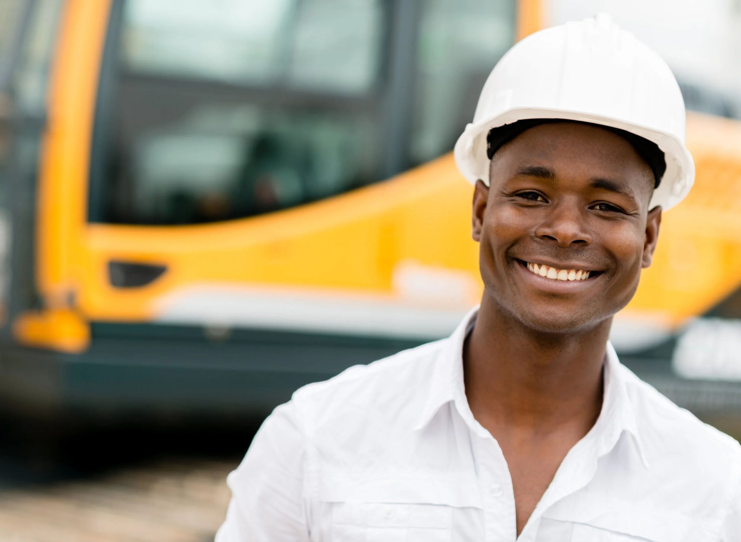 Industry professional mentoring students in a hands-on CTE trades program